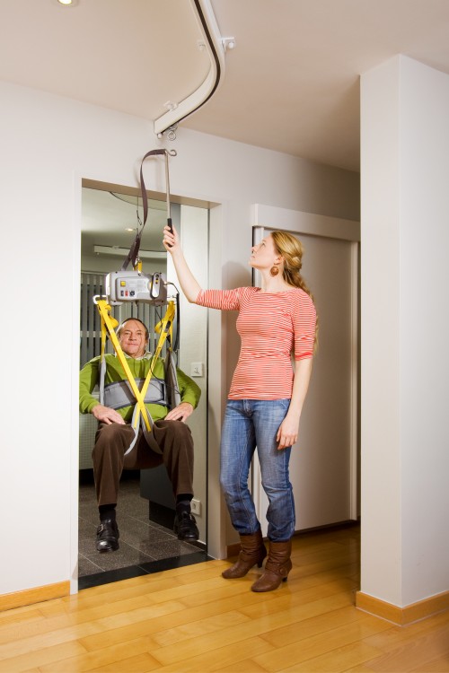 SureHands - Adapting your home - No changes to your home - Track-to-Track Motor™ , Track-to-Track Motor ™ + Tarzan , Hygiene sling , Bathing sling